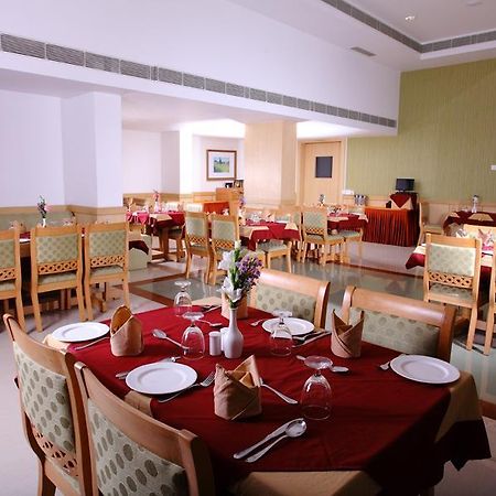 Pooram International Hotel Thrissur ภายนอก รูปภาพ